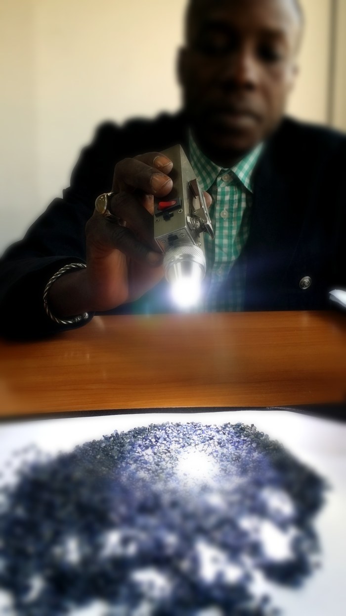 Inspecting rough gemstones during sourcing