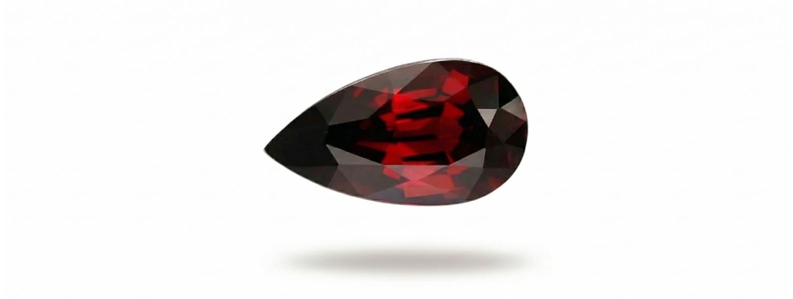natural pyrope garnet gemstone showing deep red color and clarity