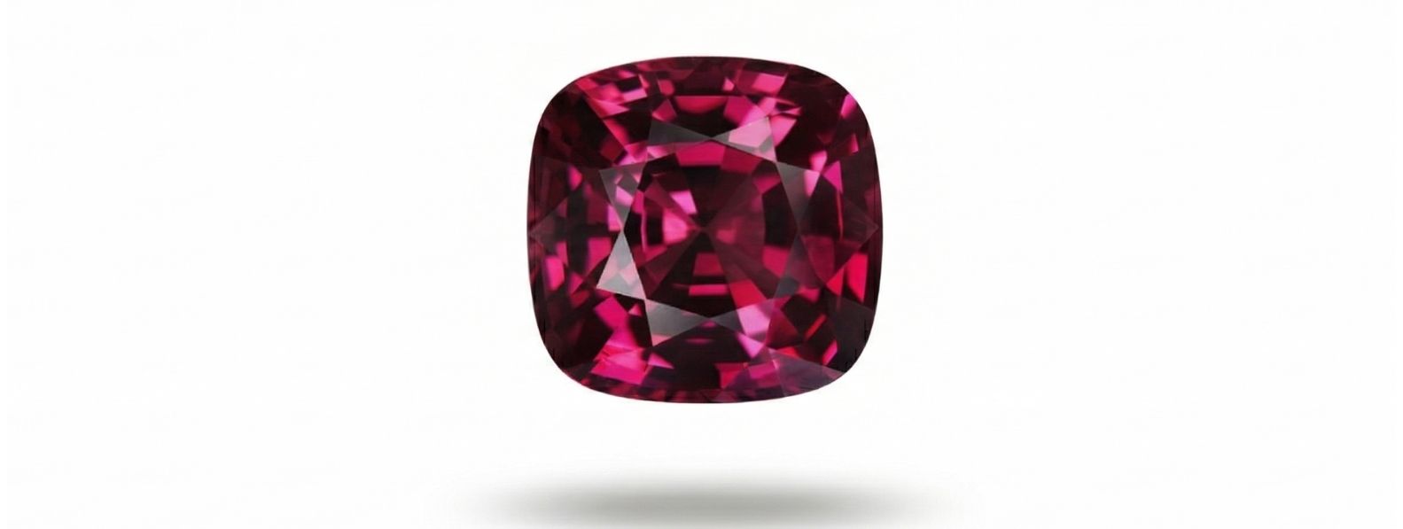 natural rhodolite garnet gemstone showing pink purple color and clarity