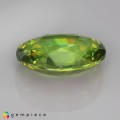 Natural Sphene 5.96 Carats Green Oval 13x10 mm Loose Gemstone - Image 4