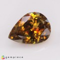 Natural Sphene 6.11 Carats Golden Yellow With Red Sparks Pear 14x10 mm Loose Gemstone - Image 1