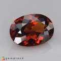 Natural Zircon 9.86 Carats Copper Orange Oval 14x11 mm Loose Gemstone - Image 1