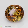 Natural Chrysoberyl 20.94 Carats Honey Brown Yellow Oval 16x15 mm Loose Gemstone - Image 1