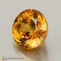 Natural Sphene 1.42 Carats Golden Yellow With Red Sparks Round 7x5 mm Loose Gemstone - Image 4
