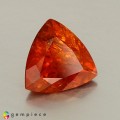 Natural Clinohumite 3.99 Carats Fire Orange Trilliant  11x11 mm Loose Gemstone - Image 1
