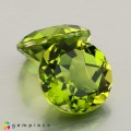 Natural Peridot 10.15 Carats Green Round 11x6 mm Loose Gemstone - Image 7