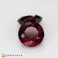 Natural Rhodolite garnet 12.97 Carats Purplish Red Round 10x6 mm Loose Gemstone - Image 1