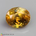 Natural Sphene 6.55 Carats Golden Yellow Oval 11x10 mm Loose Gemstone - Image 1