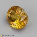 Natural Sphene 6.55 Carats Golden Yellow Oval 11x10 mm Loose Gemstone - Image 3