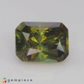 Natural Demantoid garnet 3.57 Carats Honey Green to Red Sparks Emerald Cut 10x7 mm Loose Gemstone - Image 1