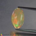 Natural Rainbow opal 2.52 Carats Rainbow Oval Cabochon 13x8 mm Loose Gemstone - Image 1