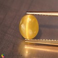 Natural Chrysoberyl cats eye 2.02 Carats Yellow Oval Cabochon 7x6 mm Loose Gemstone - Image 1