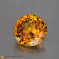 Natural Sphene 1.17 Carats Golden Yellow With Red Sparks Round 7x4 mm Loose Gemstone - Image 3