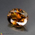 Natural Sphene 8.61 Carats Honey Yellow Brown with Red Flashes Oval 14x12 mm Loose Gemstone - Image 3