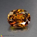 Natural Sphene 8.61 Carats Honey Yellow Brown with Red Flashes Oval 14x12 mm Loose Gemstone - Image 6