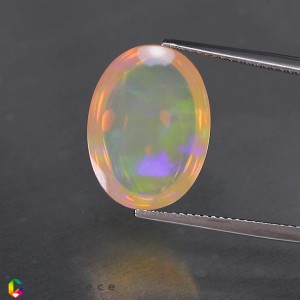 rainbow opal  7.58cts - 17x13mm rainbow opal  7.58cts - 17x13mm