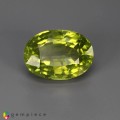 Natural Peridot 7.08 Carats Green Oval 14x10 mm Loose Gemstone - Image 1