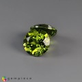 Natural Peridot 8.77 Carats Green Round 10x7 mm Loose Gemstone - Image 3