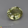 Natural Sillimanite 11.88 Carats Light Yellow Green Oval 15x12 mm Loose Gemstone - Image 1