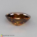 Natural Sphene 2.71 Carats Honey Yellow Brown with Red Flashes Oval 9x7 mm Loose Gemstone - Image 4
