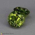 Natural Peridot 8.82 Carats Green Round 10x7 mm Loose Gemstone - Image 2