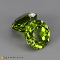 Natural Peridot 8.82 Carats Green Round 10x7 mm Loose Gemstone - Image 4