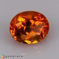 Natural Clinohumite 1.44 Carats Fanta Orange Oval 7x6 mm Loose Gemstone - Image 1
