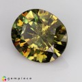 Natural Demantoid garnet 1.68 Carats Greenish Yellow Oval 8x7 mm Loose Gemstone - Image 1