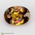 Natural Sphene 2.73 Carats Honey Yellow with Orange Red Sparks Oval 10x7 mm Loose Gemstone - Image 1