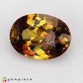 Natural Sphene 2.73 Carats Honey Yellow with Orange Red Sparks Oval 10x7 mm Loose Gemstone - Image 2