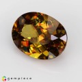 Natural Sphene 2.73 Carats Honey Yellow with Orange Red Sparks Oval 10x7 mm Loose Gemstone - Image 3