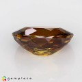 Natural Sphene 2.73 Carats Honey Yellow with Orange Red Sparks Oval 10x7 mm Loose Gemstone - Image 4