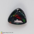 Natural Black rainbow opal 3.75 Carats Rainbow Trilliant Cabochon 12x6 mm Loose Gemstone - Image 1