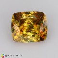 Natural Sphene 1.52 Carats Golden Yellow With Red Sparks Cushion 7x6 mm Loose Gemstone - Image 1