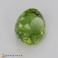 Natural Peridot 4.67 Carats Parrot Green Oval 10x9 mm Loose Gemstone - Image 4