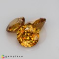 Natural Sphene 2.23 Carats Golden Yellow With Orange Flashes Round 6x3 mm Loose Gemstone - Image 1