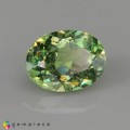 Natural Demantoid garnet 1.14 Carats Green Oval 7x5 mm Loose Gemstone - Image 1