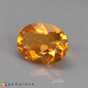 fire opal  1.24cts - 9x7mm