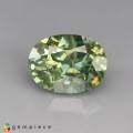 Natural Demantoid garnet  1 Carats Green Oval 7x5 mm Loose Gemstone - Image 1