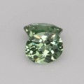 Natural Demantoid garnet pair 0.72 Carats Green Oval 4x3 mm Loose Gemstone - Image 1