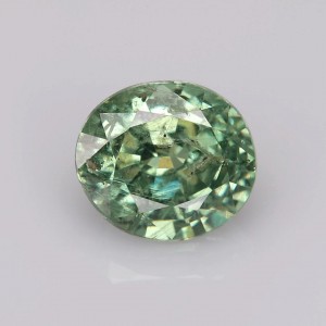 demantoid garnet  1.61cts - 7x6mm