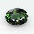 Natural Dichroic Tourmaline 4.23 Carats Fine Green to Honey Green Oval 11x8 mm Loose Gemstone - Image 1