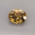Natural Sphene 3.81 Carats Golden Yellow With Orange Flashes Oval 10x8 mm Loose Gemstone - Image 1