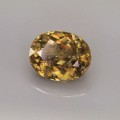 Natural Sphene 3.81 Carats Golden Yellow With Orange Flashes Oval 10x8 mm Loose Gemstone - Image 2