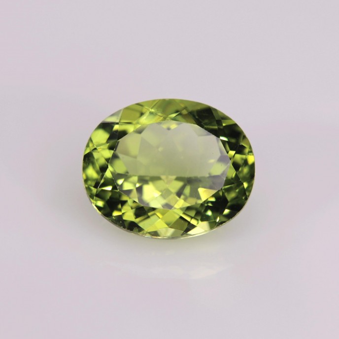 Natural Peridot 4.34 Carats Green Oval 11x9 mm Loose Gemstone - Image 1