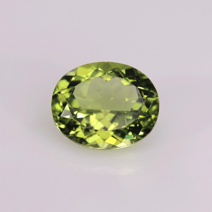 Natural Peridot 4.34 Carats Green Oval 11x9 mm Loose Gemstone - Image 2