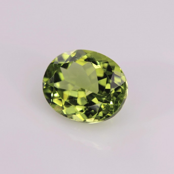 Natural Peridot 4.34 Carats Green Oval 11x9 mm Loose Gemstone - Image 3