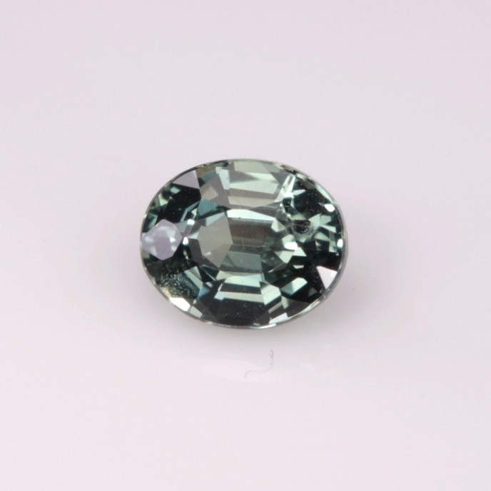 Natural Sapphire 0.57 Carats Ash Green Oval 5x4 mm Loose Gemstone - Image 1