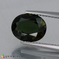 Natural Kornerupine 3.06 Carats Intense Olive Green Oval 10x8 mm Loose Gemstone - Image 1