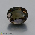 Natural Kornerupine 3.92 Carats Honey Green Oval 10x9 mm Loose Gemstone - Image 1